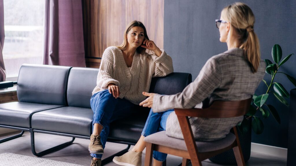 Woman Talking to a Female Psychotherapist Indoors. emdr phases